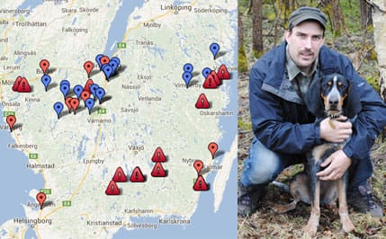 Karta som uppdateras. Allt eftersom vargobservationer rapporteras in uppdaterar Kjell Hjältman kartan. På bilden ses han med en av sina jakthundar, bluetick coonhounden Vass.